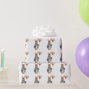 Kaninchen hält bunte Luftballons  Geschenkpapier