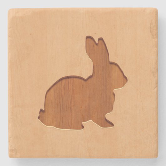 Kaninchen-Silhouette graviert auf hölzernem Steinuntersetzer (Vorderseite)