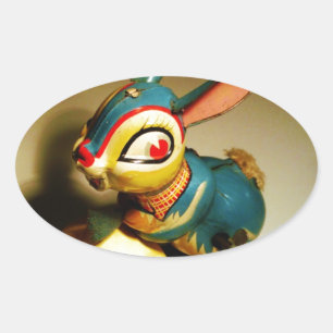 Kaninchen Spielzeug und Ostergelbe Ei Ovaler Aufkleber