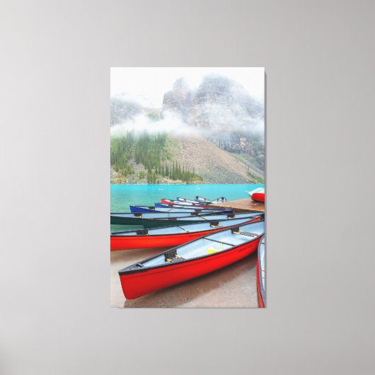 Kanus am Moraine-See Leinwanddruck (Vorderseite)