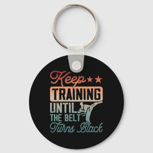 Karate Behielt Training, bis der Gürtel schwarze M Schlüsselanhänger
