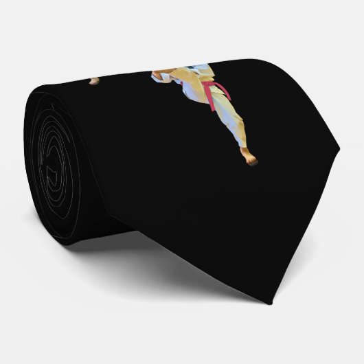 Karate, das mit farbigen Gurten tritt Krawatte (Gerollt)