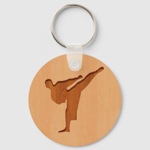 Karate silhouette engraved on wood effect schlüsselanhänger