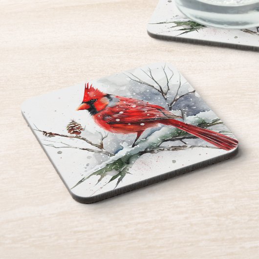 Kardinal auf dem Zweig der Schneebäume in den Weih Getränkeuntersetzer (Linke Seite)