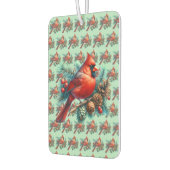 Kardinal auf der Kiefernabzweigung mit den Winterb Autolufterfrischer (Links)