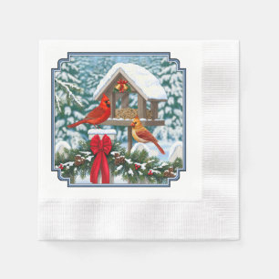 Kardinäle und Weihnachtsvogelfutterstelle Serviette