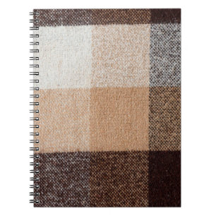 Karierte Textur aus brauner, karierter Wolle. Tart Notizblock