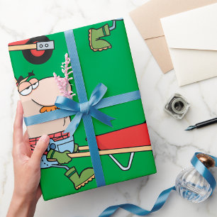Karikatur eines Bauern mit Schubkarre und Werkzeug Geschenkpapier