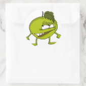 Karikaturenfigur aus grünem Apfel mit einem bösen Runder Aufkleber (Tasche)