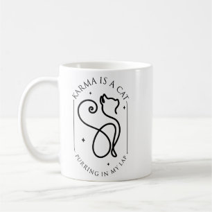 Karma ist eine Katze, die auf meinem Schoß schnurr Kaffeetasse