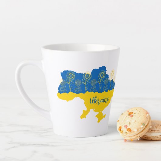 Karte der Ukraine mit Sonnenblumen und ukrainische Milchtasse (Beispiel)