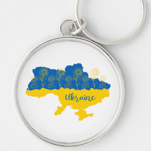 Karte der Ukraine mit Sonnenblumen und ukrainische Schlüsselanhänger