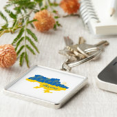 Karte der Ukraine mit Sonnenblumen und ukrainische Schlüsselanhänger (Seite)