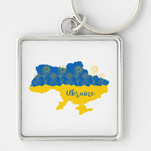 Karte der Ukraine mit Sonnenblumen und ukrainische Schlüsselanhänger