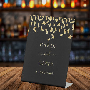 Karten Geschenke schwarz gold Konfetti Sockelschild