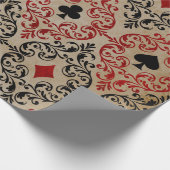Kartenspiel-Anzug und Rollen auf Tan Geschenkpapier (Ecke)