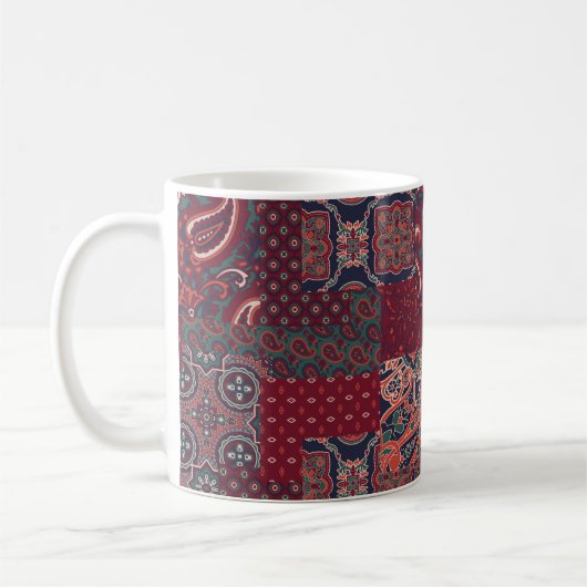Kaschmirpaisley-Seidengewebe abstrakt Kaffeetasse (Links)