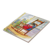 Kätzchen aus den 30er Jahren, die auf einem Porch- Fliese (Seite)