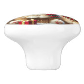 Kätzchen in festlicher Weihnachtsdekoration und Sc Keramikknauf (Seitenansicht)