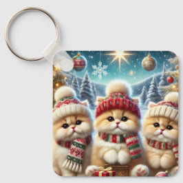 Kätzchen in festlicher Weihnachtsdekoration und Sc Schlüsselanhänger