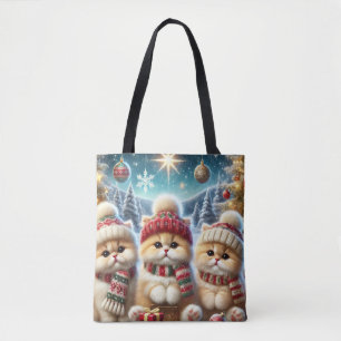 Kätzchen in festlicher Weihnachtsdekoration und Sc Tasche
