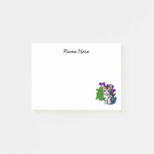 Kätzchen Stehend vor einer farbigen Tintenflasche Post-it Klebezettel