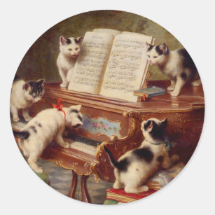 Kätzchen und Klavier Runder Aufkleber
