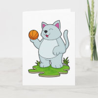 Katze als Basketballspieler mit Basketball