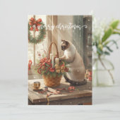 Katze arrangiert Winterblumen für Weihnachten (Stehend Vorderseite)