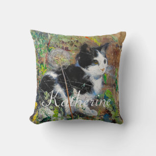 Katze auf Blumenbeet Kissen