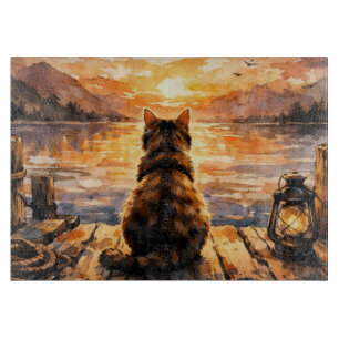 Katze auf Dock bei Sonnenuntergang Schneidebrett