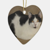 Katze auf einem Sofa Keramikornament (Links)