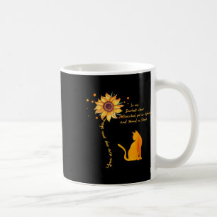 Katze, dass du meine Sonnenblume in meinem dunkels Kaffeetasse
