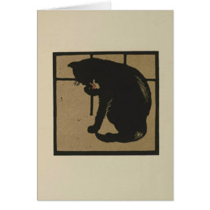 Katze, die ihre Pfoten leckt