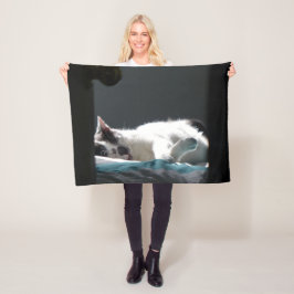 Katze im Sonnenfleck stört nicht Fleecedecke