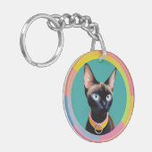 Katze mit auffälligen Augen nach kreisförmigem Spi Schlüsselanhänger (Vorderseite links)