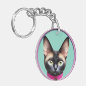 Katze mit auffälligen Augen nach kreisförmigem Spi Schlüsselanhänger (Vorderseite links)