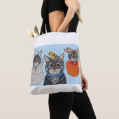 Katze mit Engel und Teufel Tasche (Von Nahem)