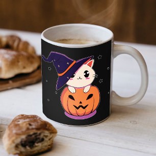 Katze mit Hexenhut in Halloween-Kürbisgesicht Kaffeetasse