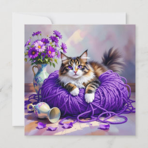 Katze mit lila Augen in lila Garn und Blumen