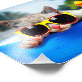 Katze mit Sonnenbrille, die sich auf einer Luftmat Fotodruck (Ecke)