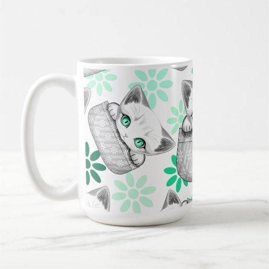 Katze Niedlich und spielerisch aus einem Pocket Kaffeetasse (Links)
