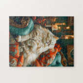 Katze schläft auf gemütlichem Sessel bei Kerzenlic Puzzle (Horizontal)