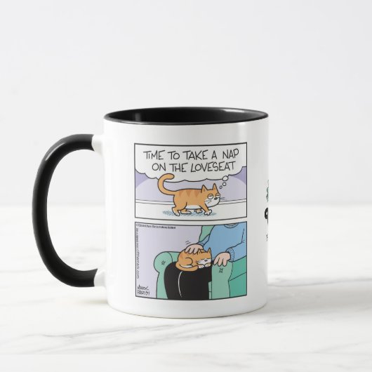 Katze sitzt auf Zweisitzer (Schoß) Tasse (Links)