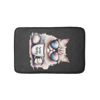 Katze trägt eine Sonnenbrille und hält eine Kaffee Badematte