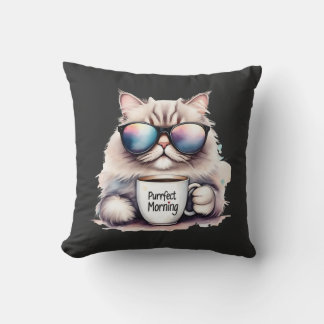 Katze trägt eine Sonnenbrille und hält eine Kaffee Kissen