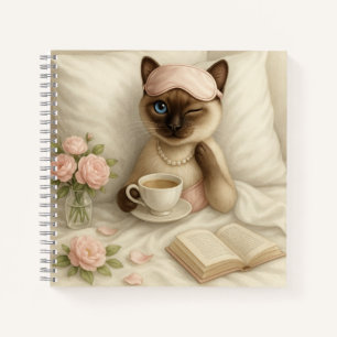 Katze trinkt Kaffee im Bett Notizblock