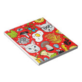 Katze und Ei in Rot Notizblock (angewinkelt)