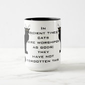 Katzen angebetet als Götter; Sie haben nicht Tasse (Zentrum)