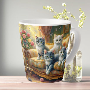 Katzen auf dem Sofa - niedliche Szene im Vintagen Milchtasse